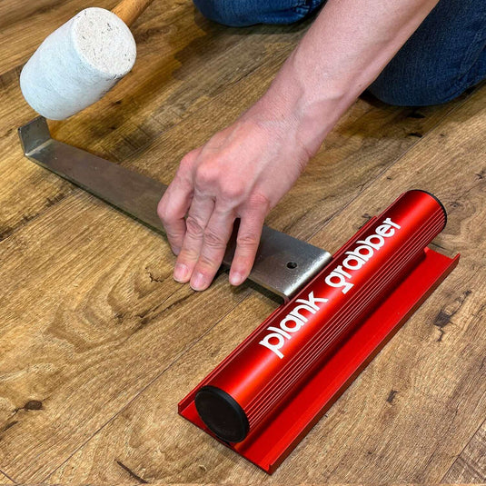 Floor Fix Pro Plank Grabber Plank Grabber is a tool for fixing gaps in floating floors. It features a "Magic Grip Strip" that sticks to the plank you want to move using nano-suction and without leaving any sticky residue. Plank Grabber can be used to fix